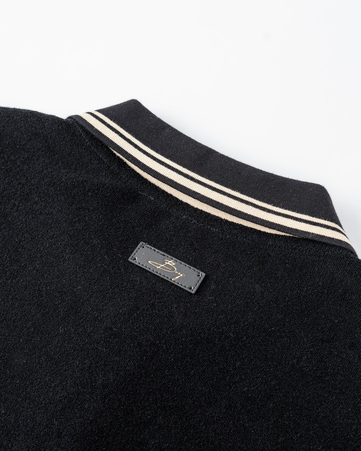 The Noir Eleganté Polo